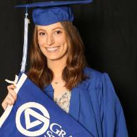 photobooth GradFest with grand valley flag